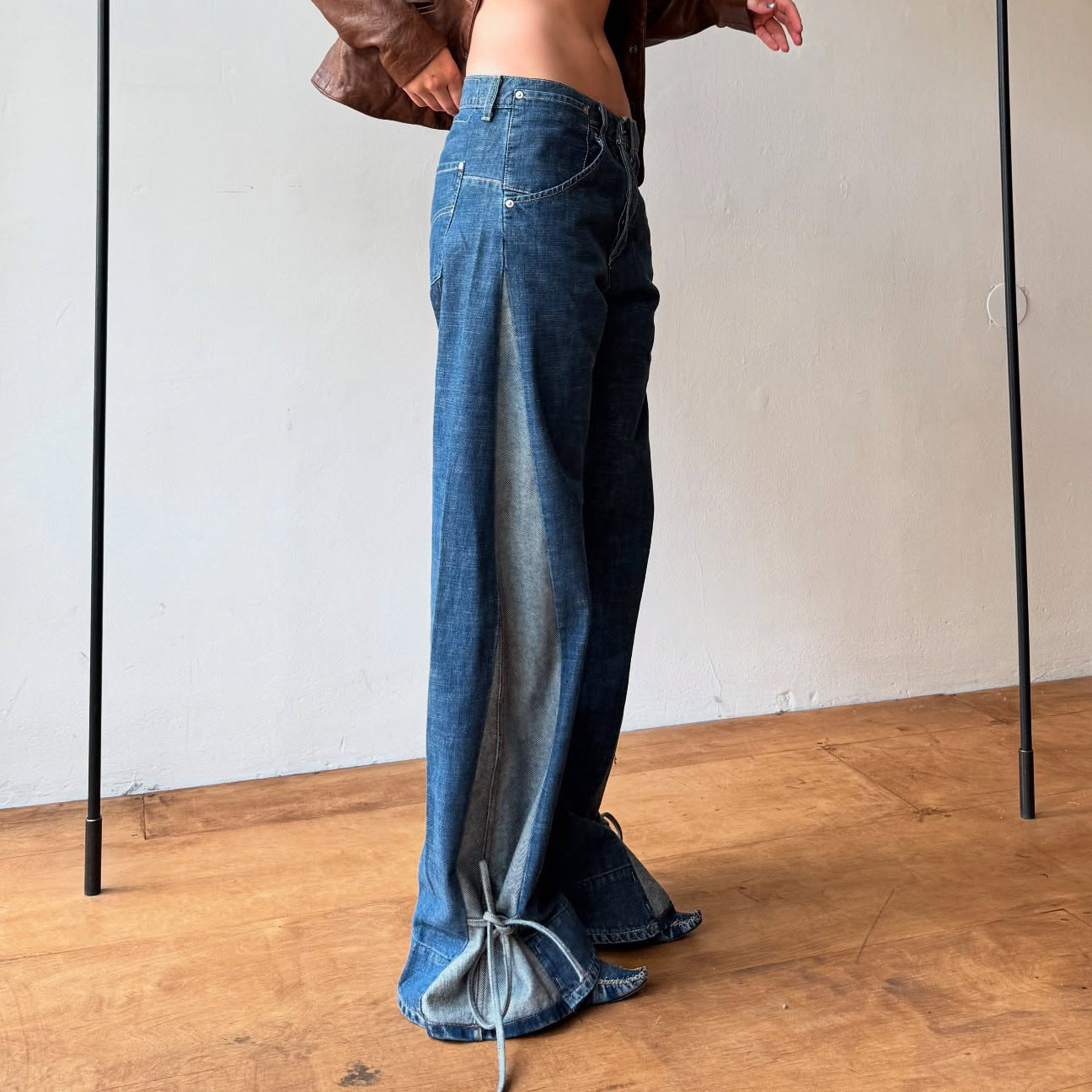 Women's design sense lace-up hem side color-blocked jeans, versatile street style American wide-leg straight-leg pants